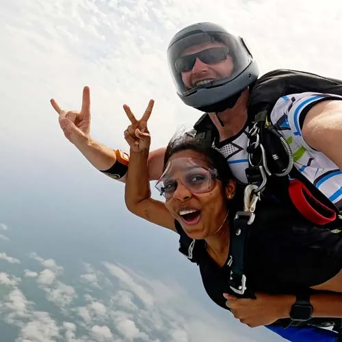 woman skydiving with tandem instructor in sri lanka