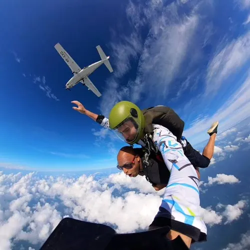 passenger and instructor jumping out of plane with skydive sri lanka