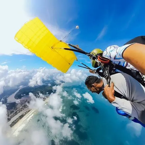 passenger and skydiving instructor flying parachute in sri lanka
